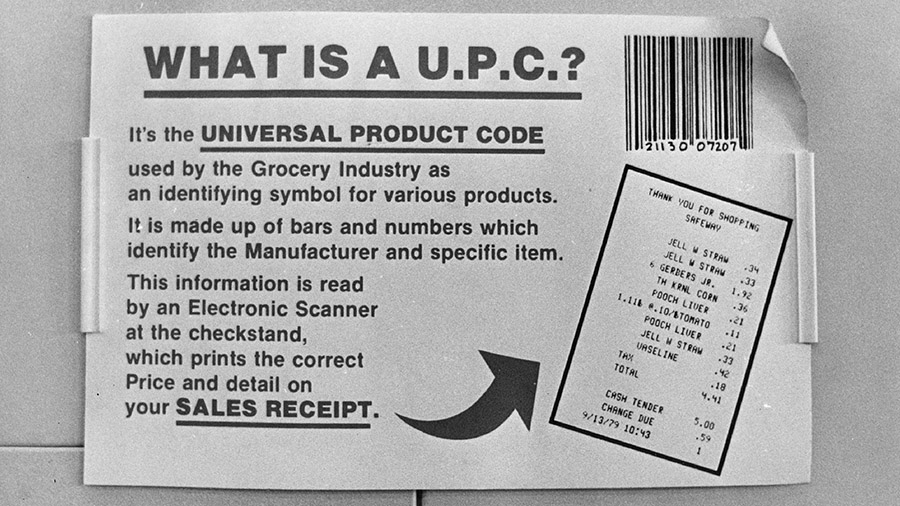 A sign from 1980 introduces the UPC to shoppers at a supermarket checkout in Aurora, Denver. (The D...