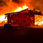 The barn on fire as fire crews arrived. (Weber Fire District)