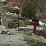 Heavy water streams rush through neighborhoods in North Ogden as the record snowpack melts under record-high temperatures. (KSL TV)