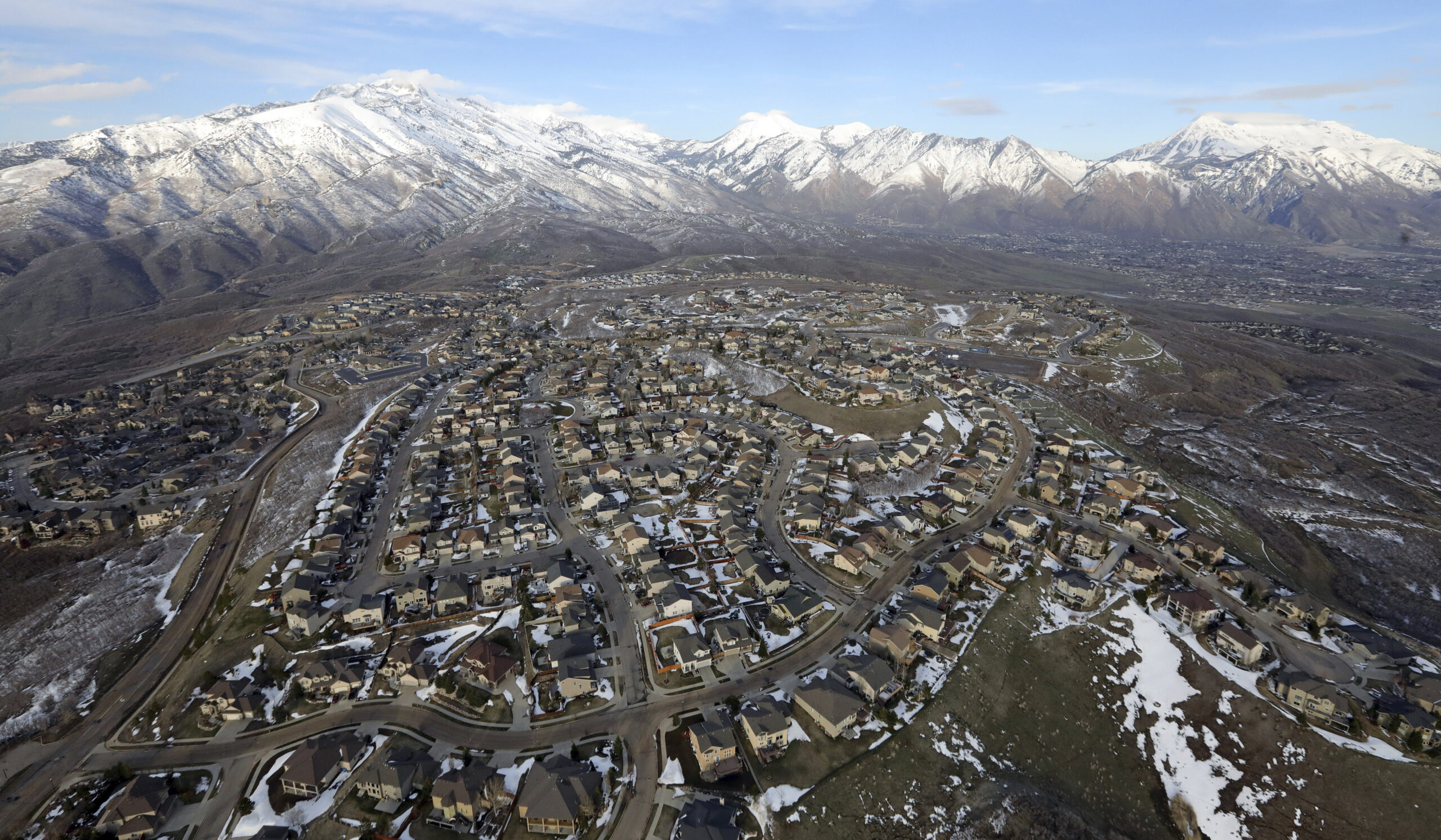 FILE - Rows of homes, in suburban Salt Lake City, on April 13, 2019. America got older last decade....