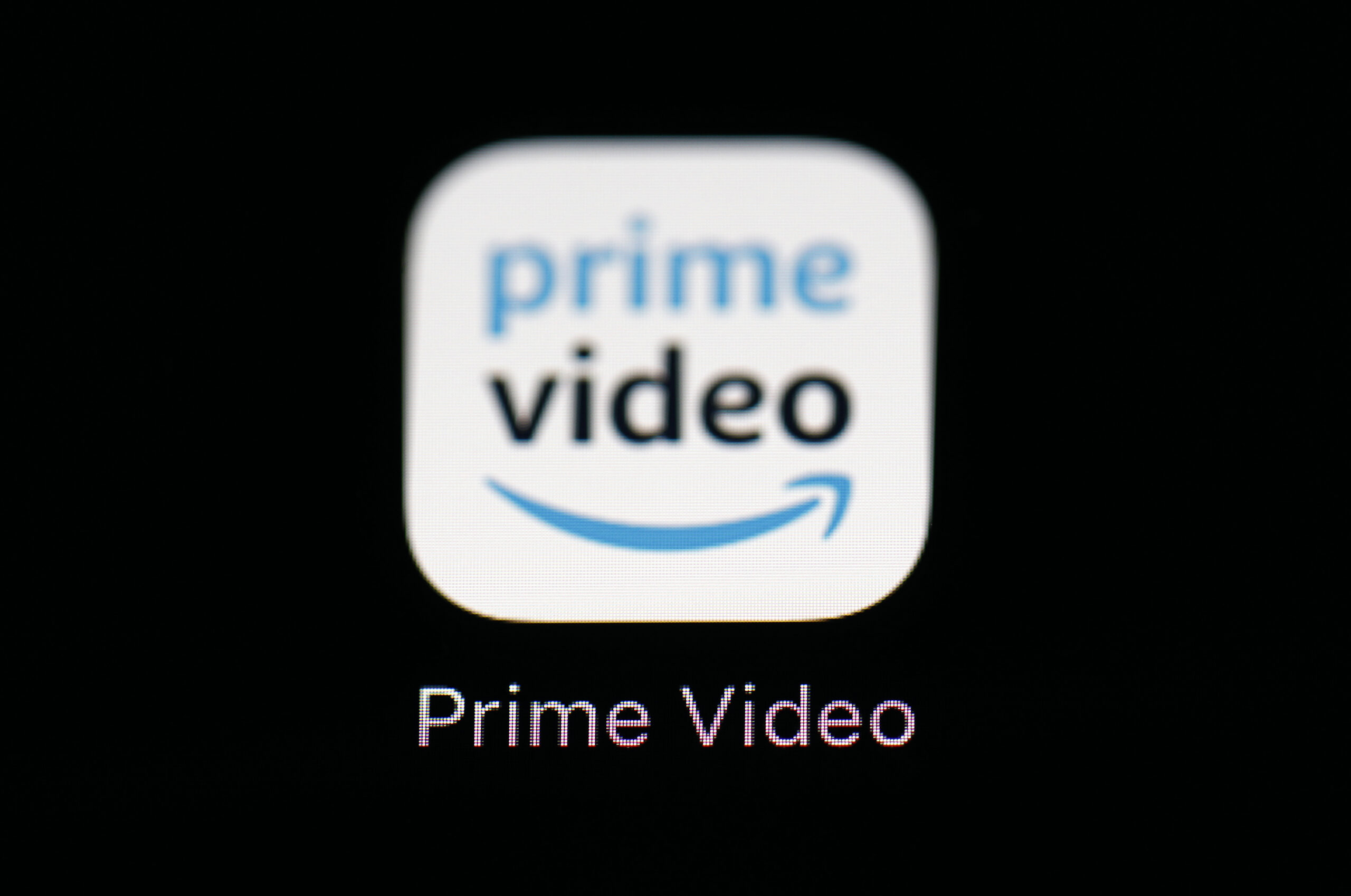 FILE - Amazon's Prime Video streaming app is seen on an iPad, March 19, 2018, in Baltimore. Amazon ...