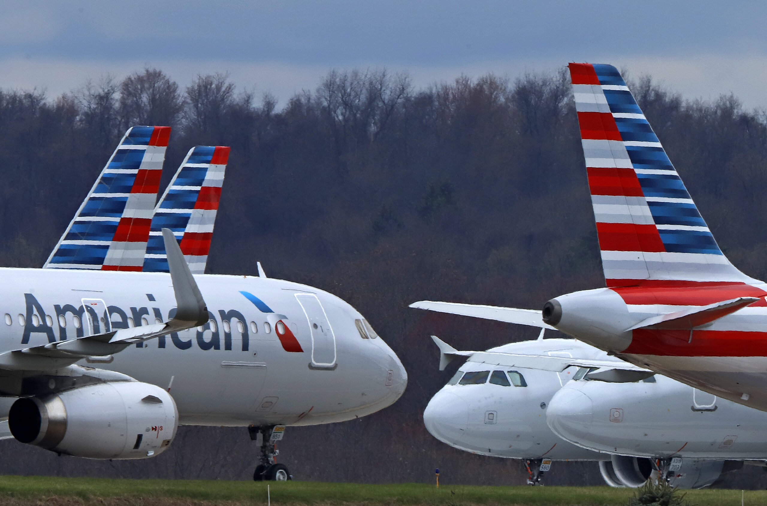 FILE - American Airlines planes are parked at Pittsburgh International Airport on March 31, 2020, i...