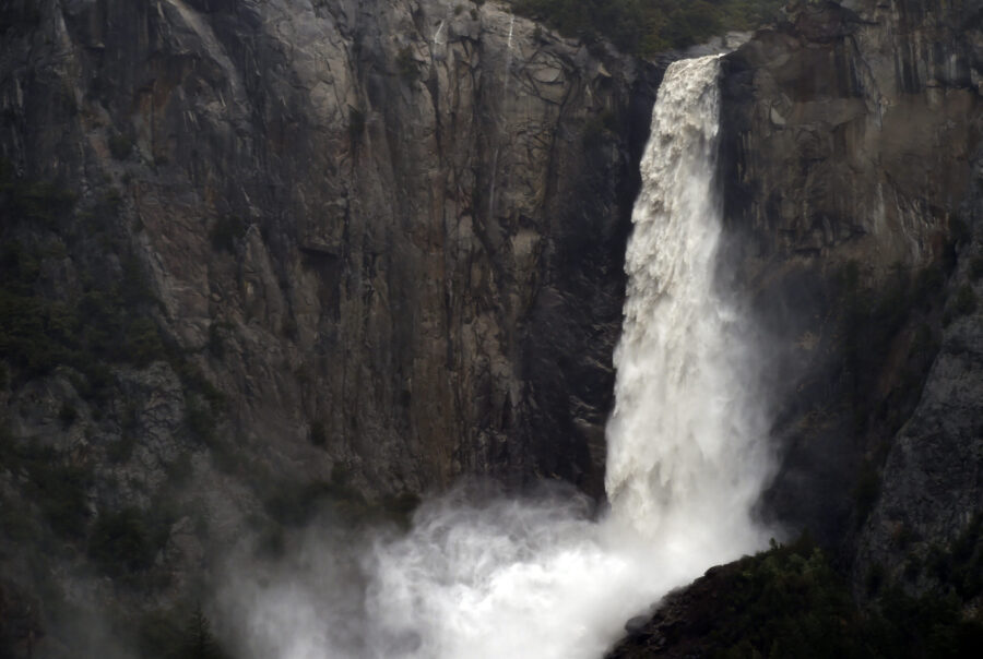 FILE - In this April 7, 2018, file photo, the raging Bridalveil Fall plummets into Yosemite Valley,...