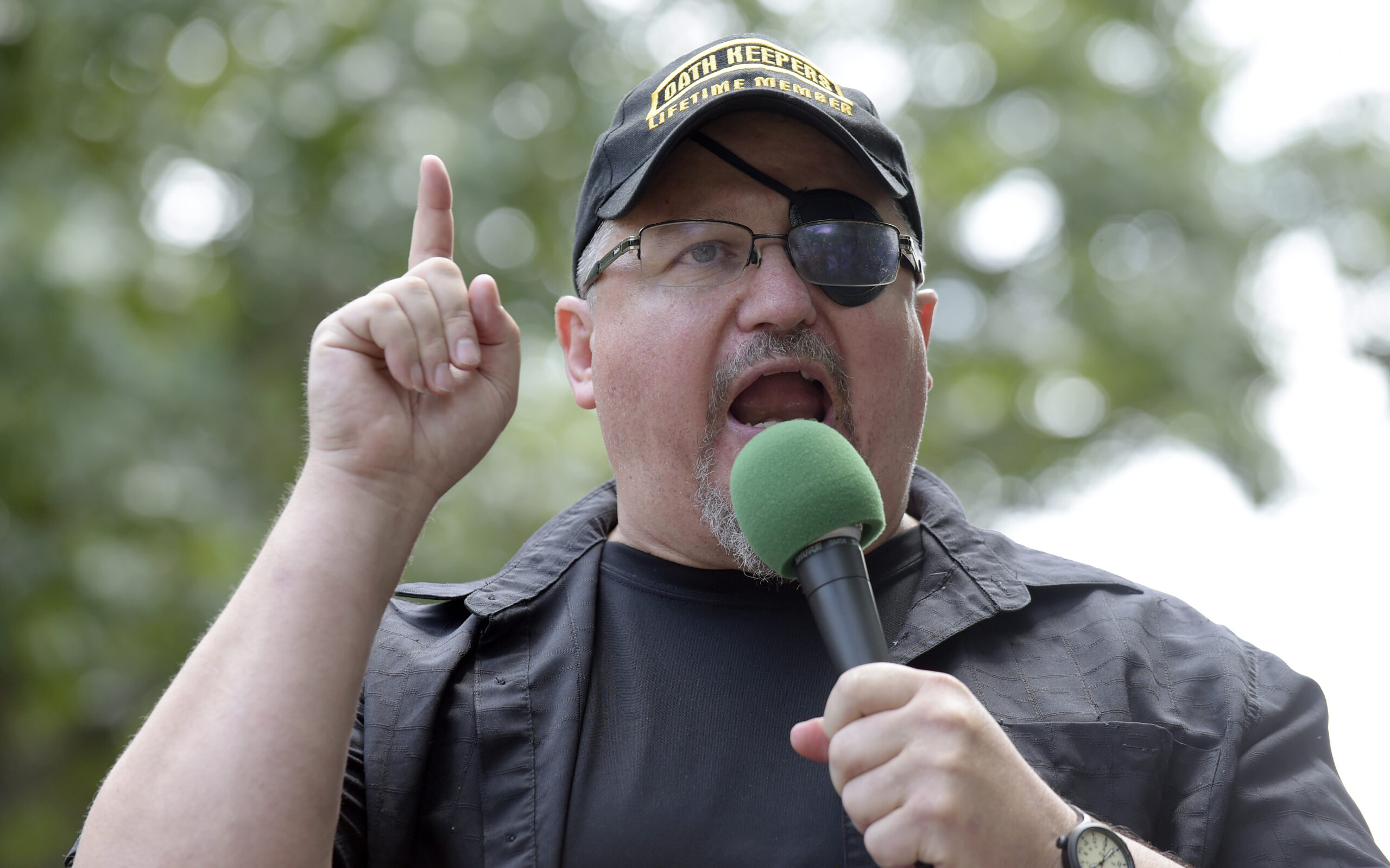 FILE - Stewart Rhodes, founder of the Oath Keepers, speaks during a rally outside the White House i...