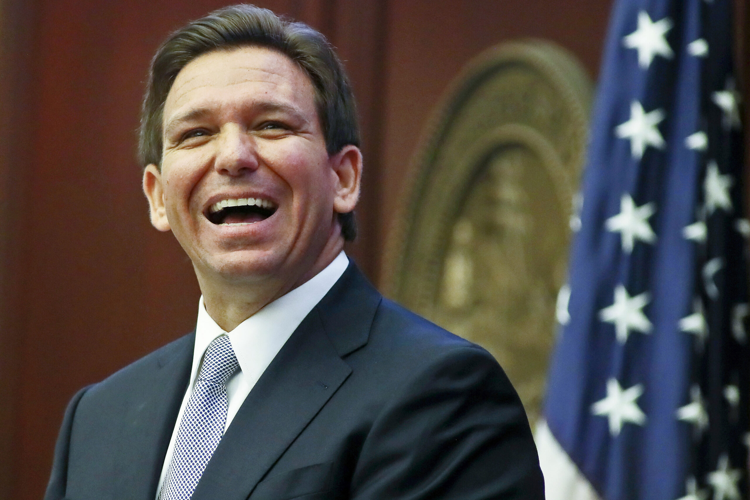 FILE - Florida Gov. Ron DeSantis reacts to applause as he gives his State of the State address duri...