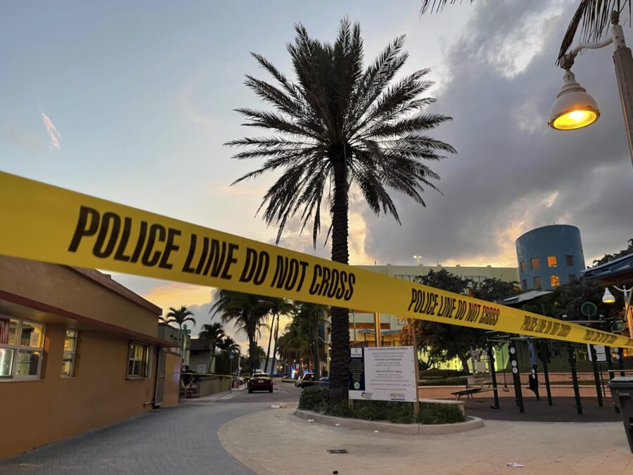 Police respond to a shooting near the Hollywood Beach Broadwalk in Hollywood, Fla., Monday evening,...