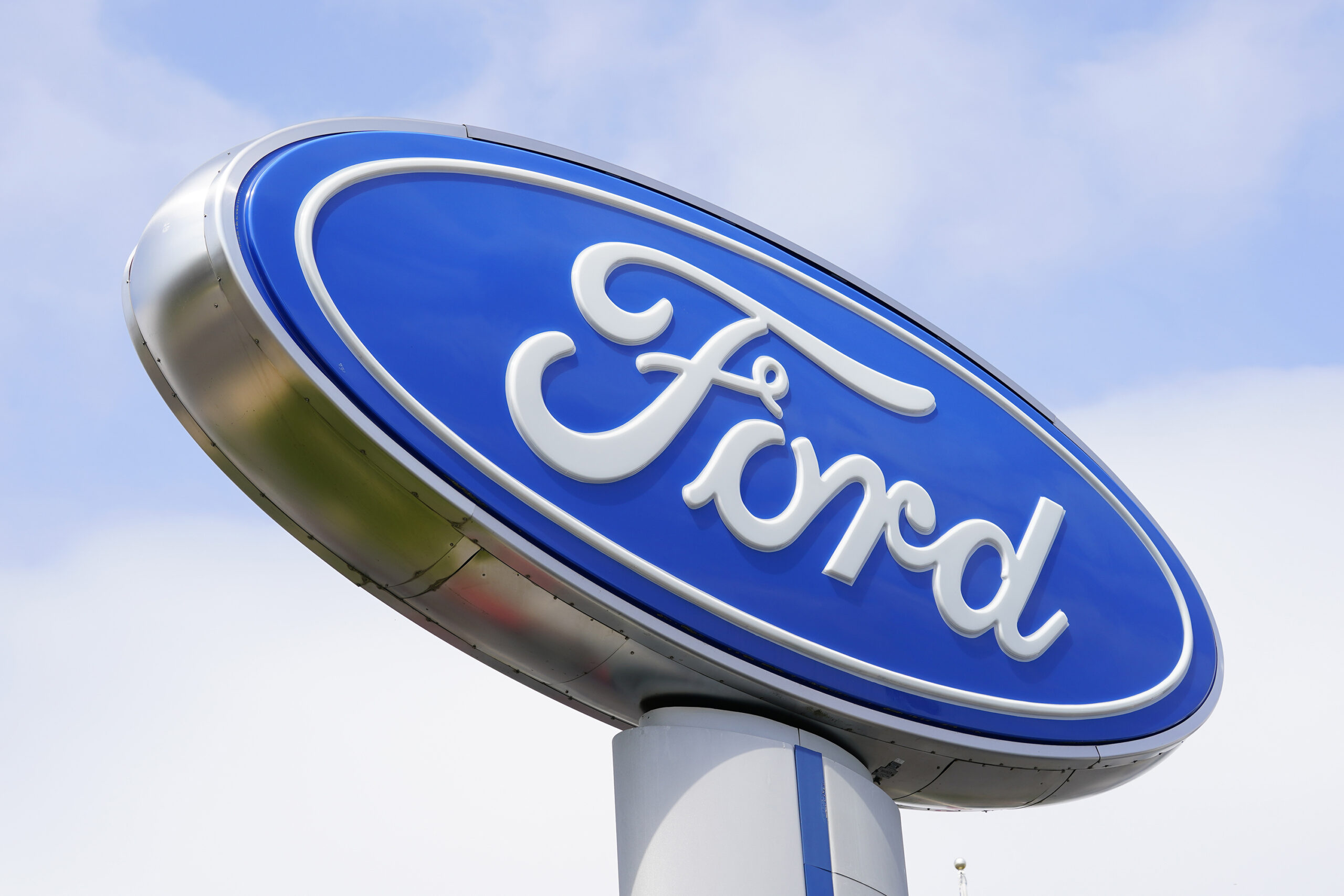 FILE - A Ford sign is shown at a dealership in Springfield, Pa., Tuesday, April 26, 2022. Ford Moto...