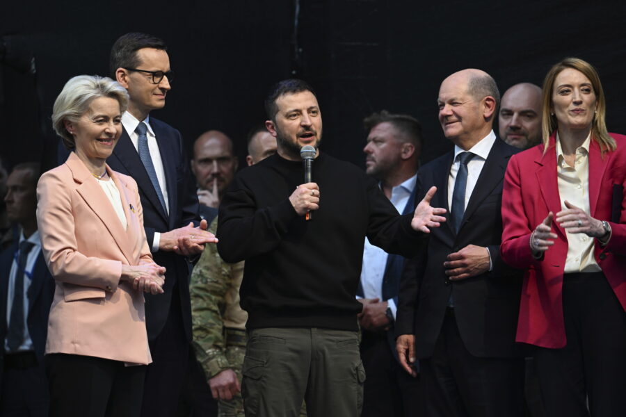 Ukrainian President Volodymyr Zelenskyy, center, talks to the crowd after the award ceremony of the...