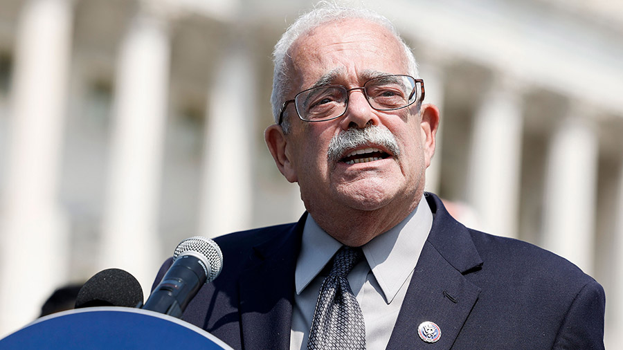 Rep. Gerry Connolly, here in 2022, said two staffers were injured Monday by a man wielding a bat wh...