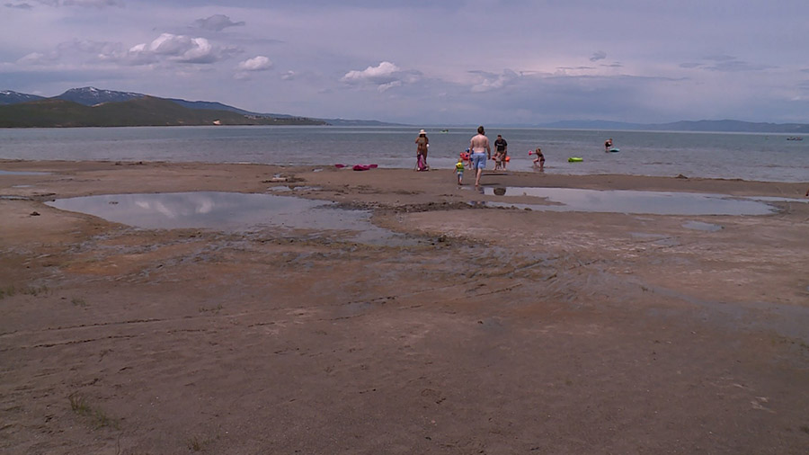 Bake Lake visitors on the shrinking beach. (KSL TV)...