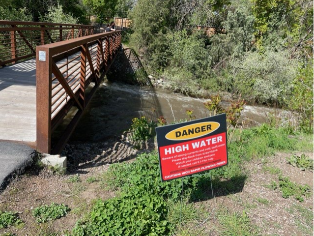 Big Cottonwood Creek in Knudsen Park, which is partially closed due to imminent flooding. Photo Cou...