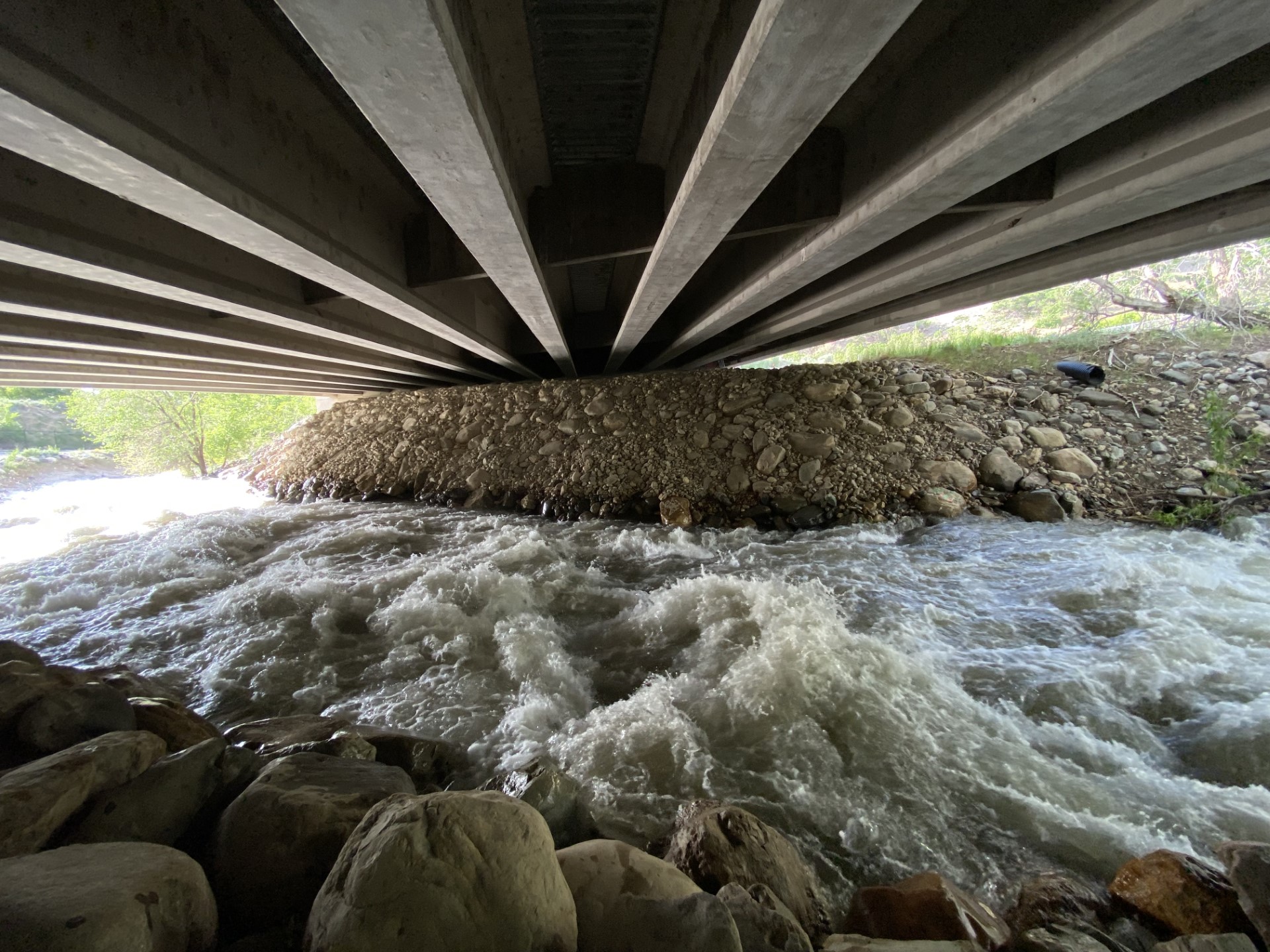 High and cool waters rushing under a bridge in Little Cottonwood Canyon. (KSL TV)...