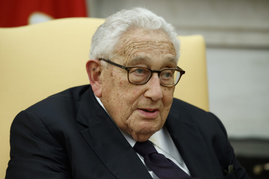 Former Secretary of State Henry Kissinger speaks during a meeting with President Donald Trump in th...