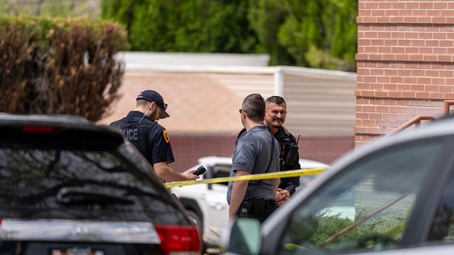 Salt Lake City police officers investigating the scene. (Salt Lake City Police Department)...