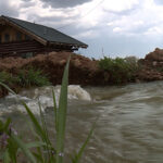 Runoff flowing through Woodruff streets and homes (KSLTV)