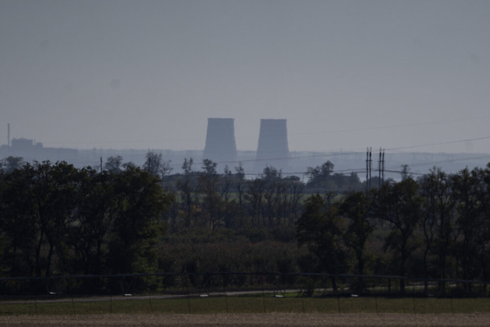 FILE - Zaporizhzhia nuclear power plant is seen from around twenty kilometers away in an area in th...