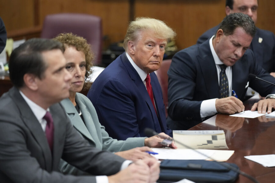 FILE - Former President Donald Trump sits at the defense table with his legal team in a Manhattan c...