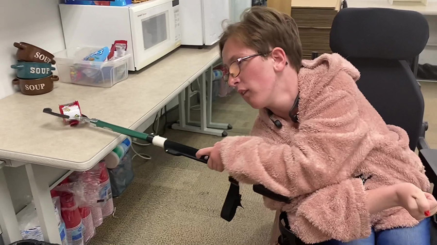 Shawnie Christensen using the special device made for her by USU. (Courtesy: Utah assistive Technol...