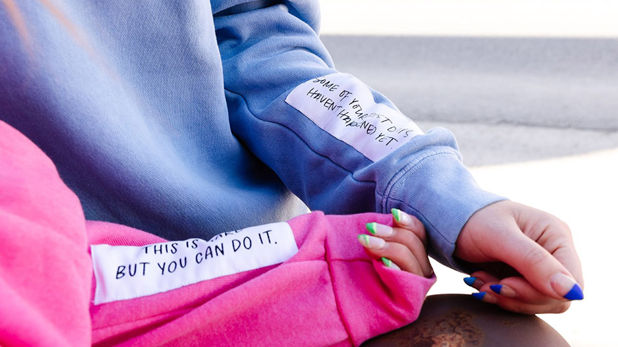 The encouraging messages on the sweatshirts. (Courtesy: No Norm Co)...