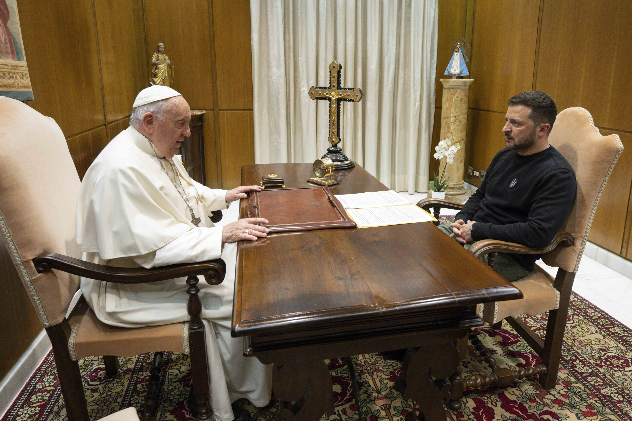 This image made available by Vatican News shows Pope Francis meeting Ukrainian President Volodymyr ...