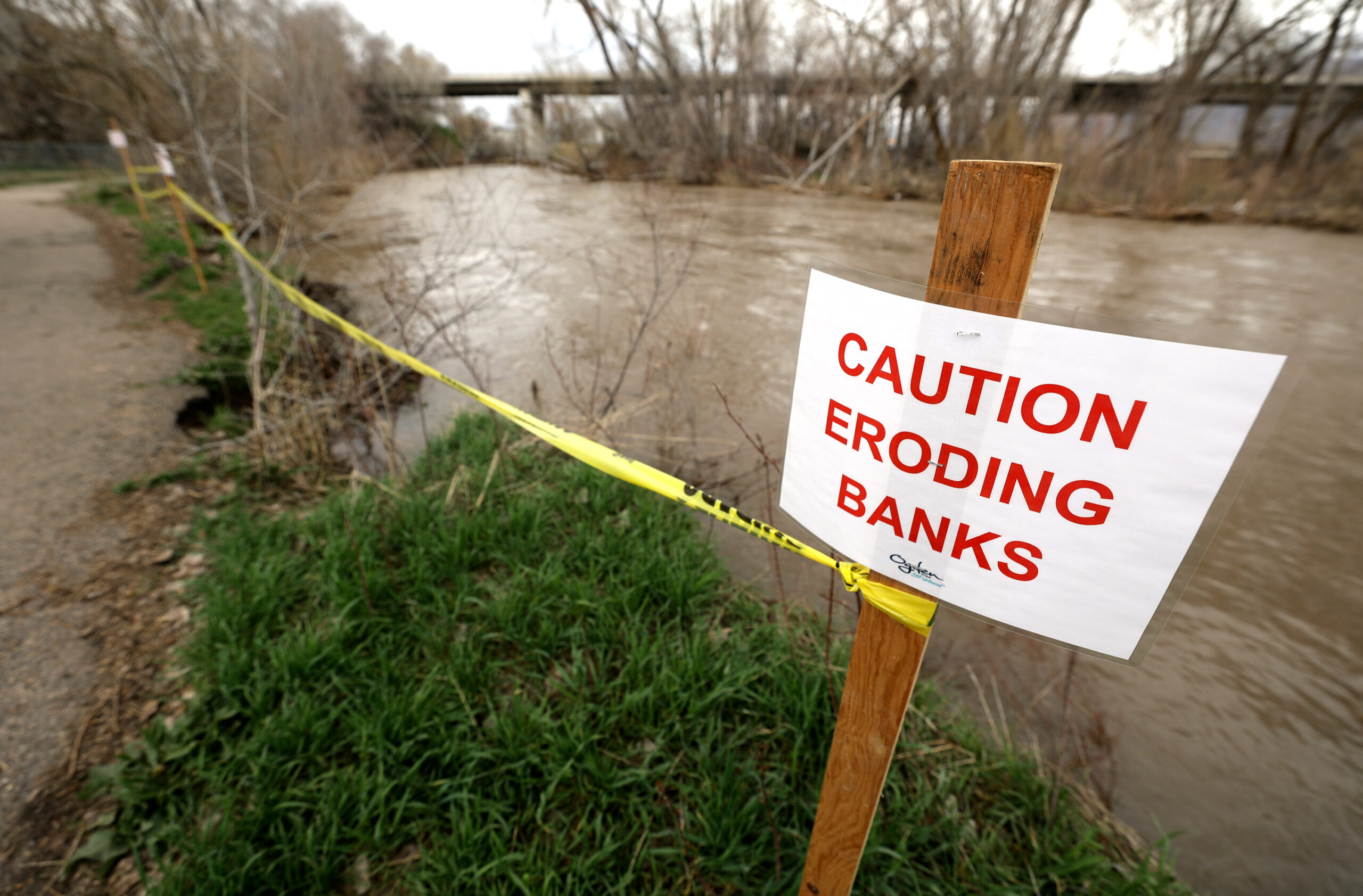 Eroding banks are roped off as the Weber River swells from  a melting snowpack in Fort Buenaventura...