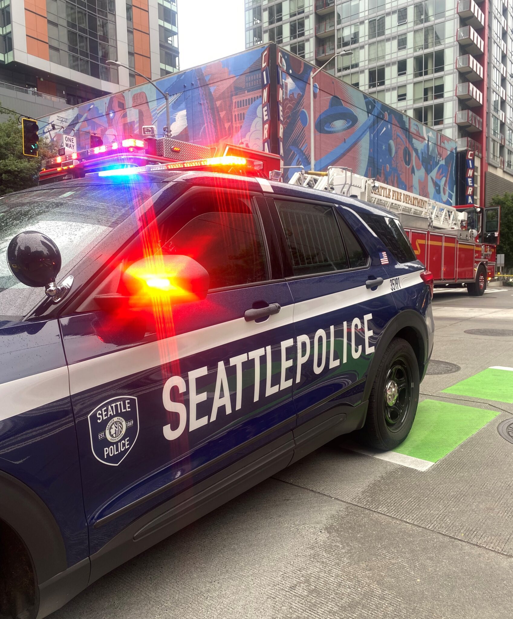 Seattle police respond to an incident near 4th Avenue and Lenora Street where a pregnant woman was shot and killed