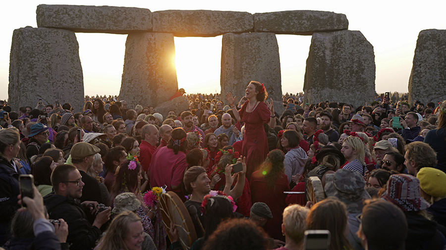 Revelers gather at the ancient stone circle Stonehenge to celebrate the Summer Solstice, the longes...