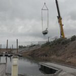 One of the boats being lowered into the Great Salt Lake marina by crane. (KSL TV)