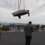 One of the boats being lowered into the Great Salt Lake marina by crane. (KSL TV)