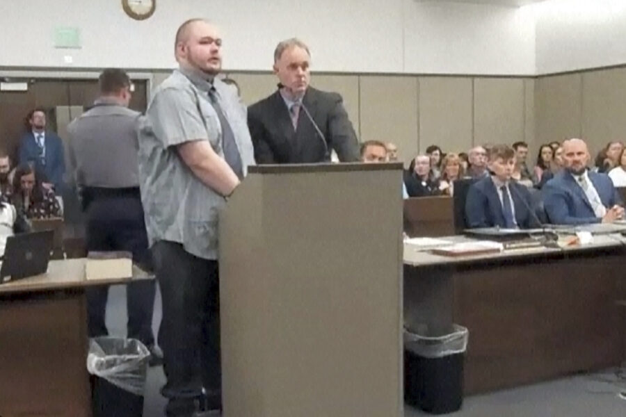 In this image taken from video provided by the Colorado Judicial Branch, Anderson Lee Aldrich, left...