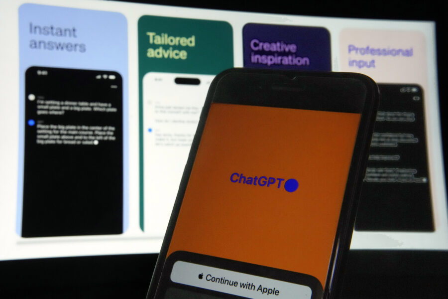 FILE - OpenAI's ChatGPT app is displayed on an iPhone in New York, May 18, 2023. With companies dep...