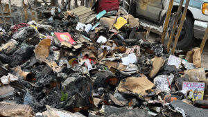 a pile of burned belongings 