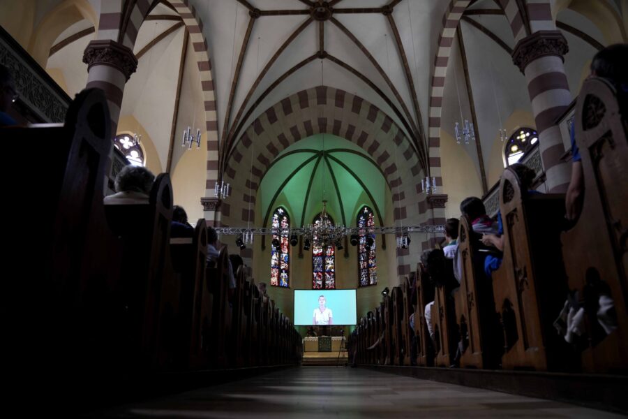 People attend a church service in Nuremberg, Germany, Friday, June 9, 2023. Hundreds of German Prot...