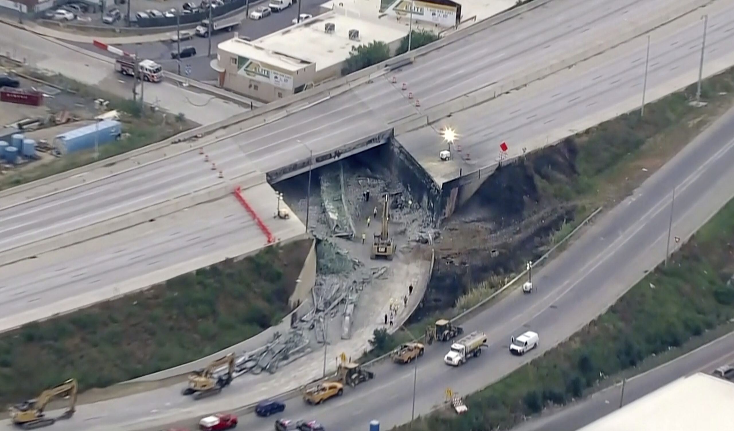 This screen grab from video provided by WPVI-TV/6ABC shows the collapsed section of I-95 as crews c...