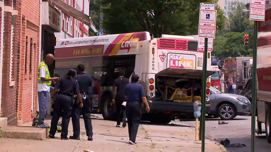 Baltimore City Police told CNN an MTA bus collided with a Lexus at North Paca Street at West Mulber...
