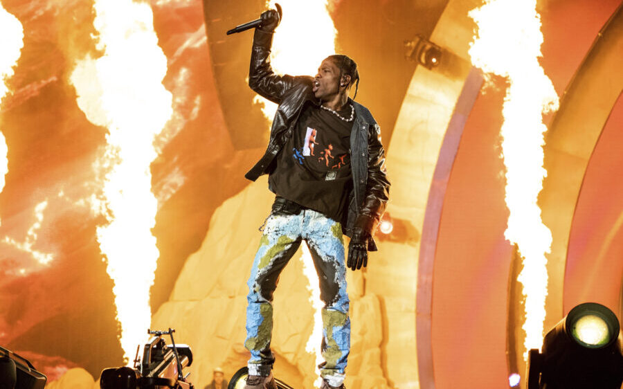 FILE - Travis Scott performs at the Astroworld Music Festival in Houston, Nov. 5, 2021. A Texas gra...