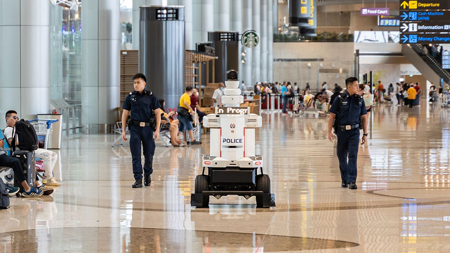 The robots patrol alongside Singapore Police Force frontline officers and serve as additional eyes ...