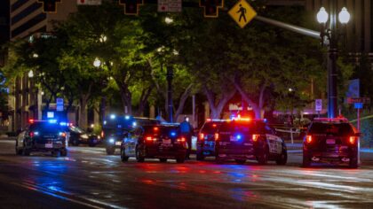 Police cars with lights on in Salt Lake