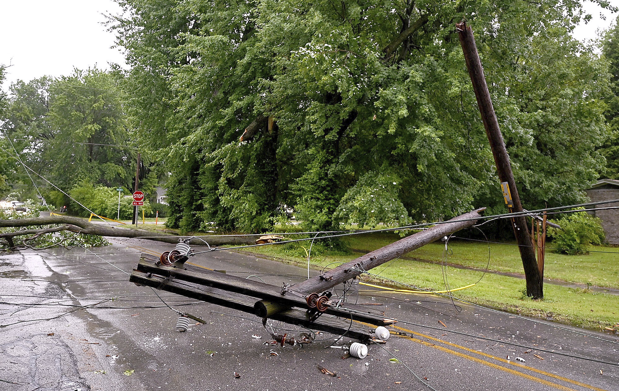 Traffic is rerouted due to a downed power line near the intersection of Brown and College avenues i...