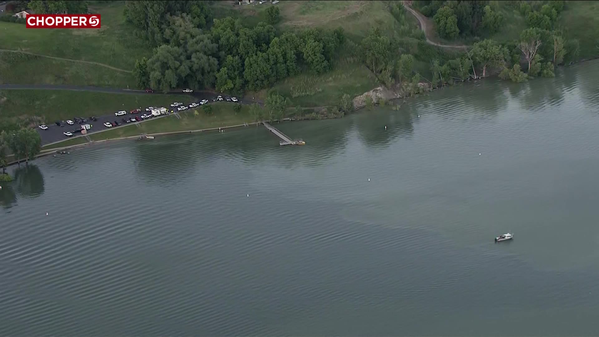 Aerial view of search and rescue crews at Hyrum Dam day beach area....