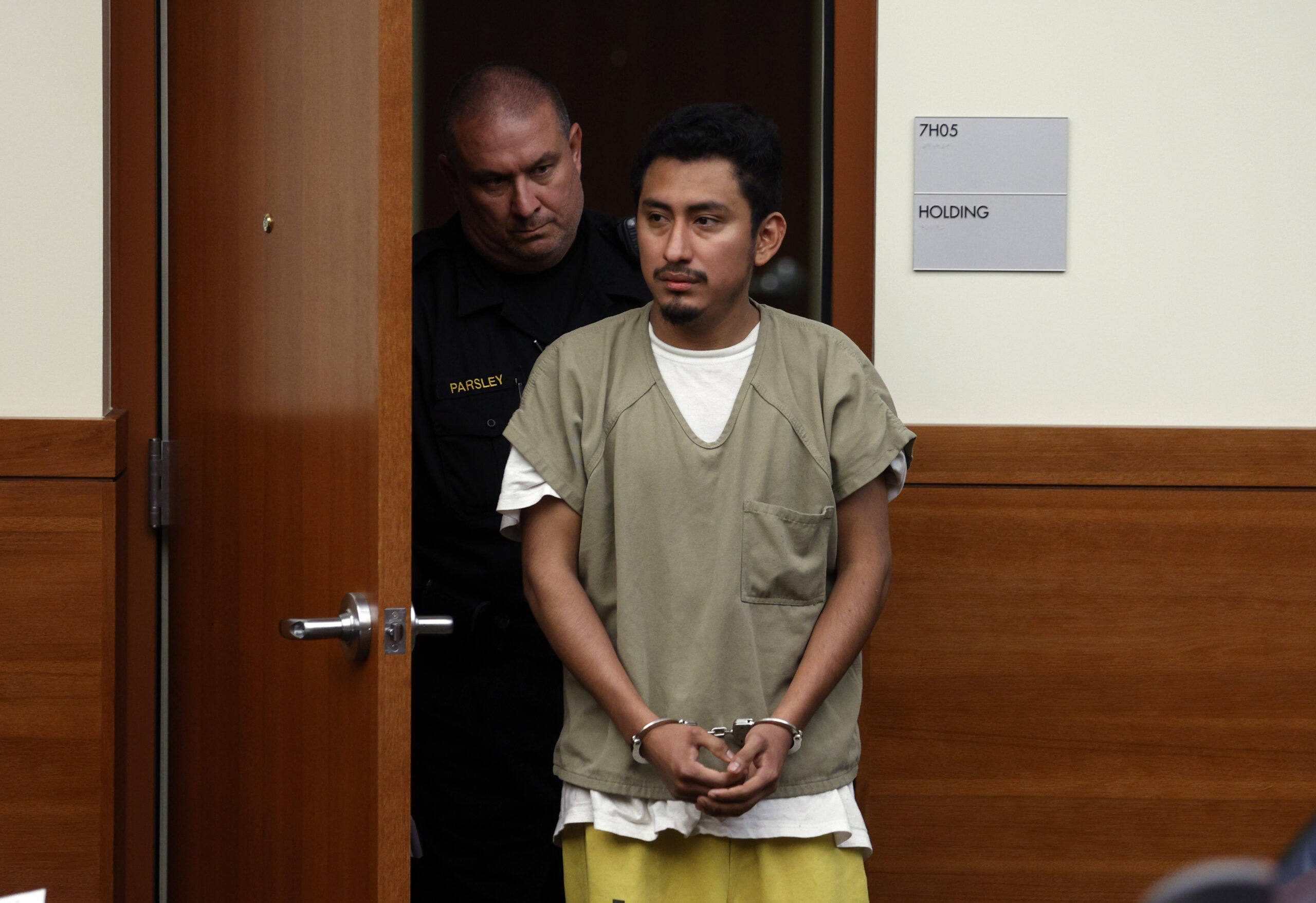 FILE - Gerson Fuentes, right, the man accused of raping and impregnating a 9-year-old Ohio girl, wh...