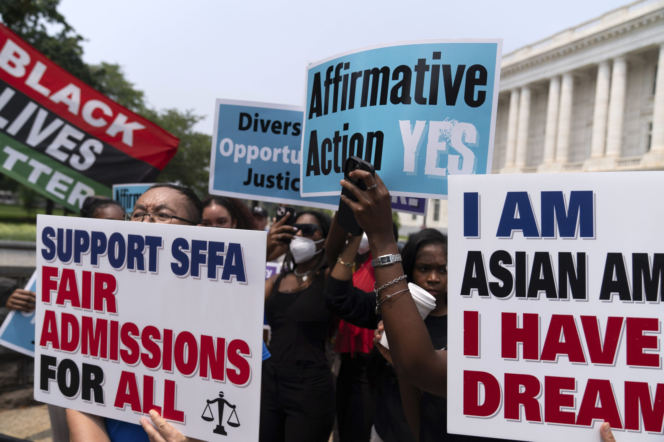 FILE - Demonstrators protest outside of the Supreme Court in Washington, Thursday, June 29, 2023, a...