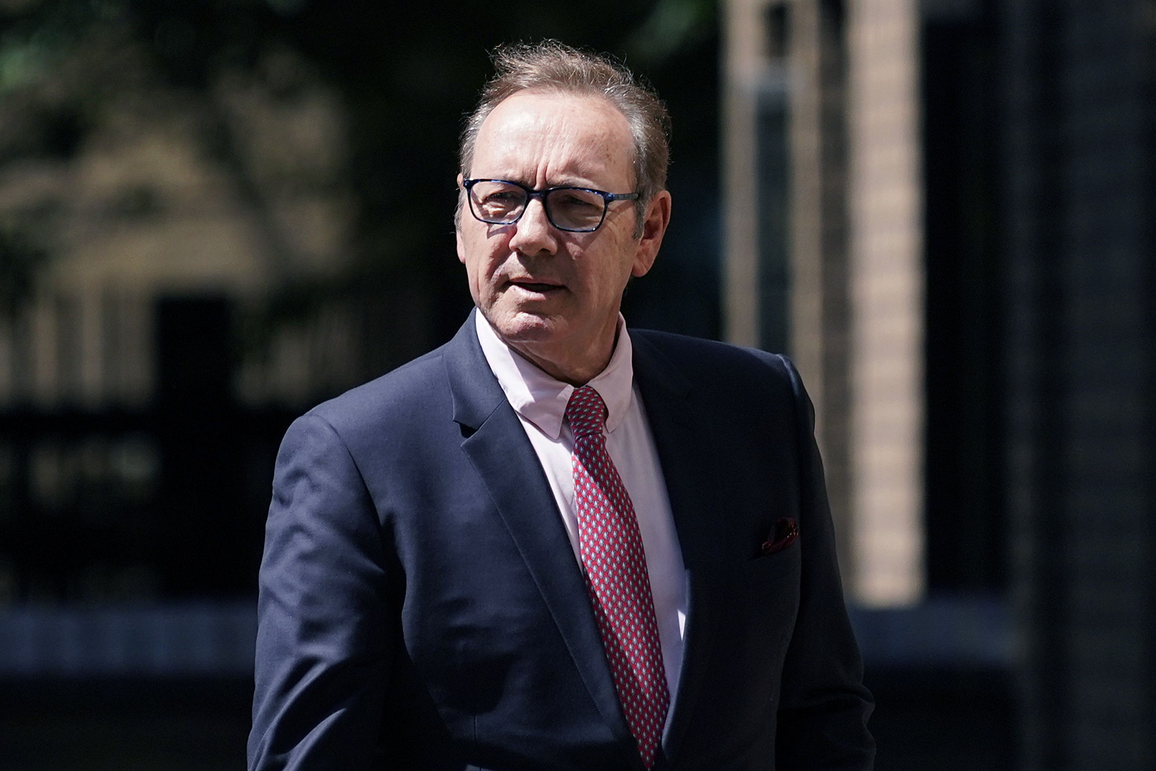 Actor Kevin Spacey walks outside Southwark Crown Court in London, Wednesday, July 26, 2023. The Jur...