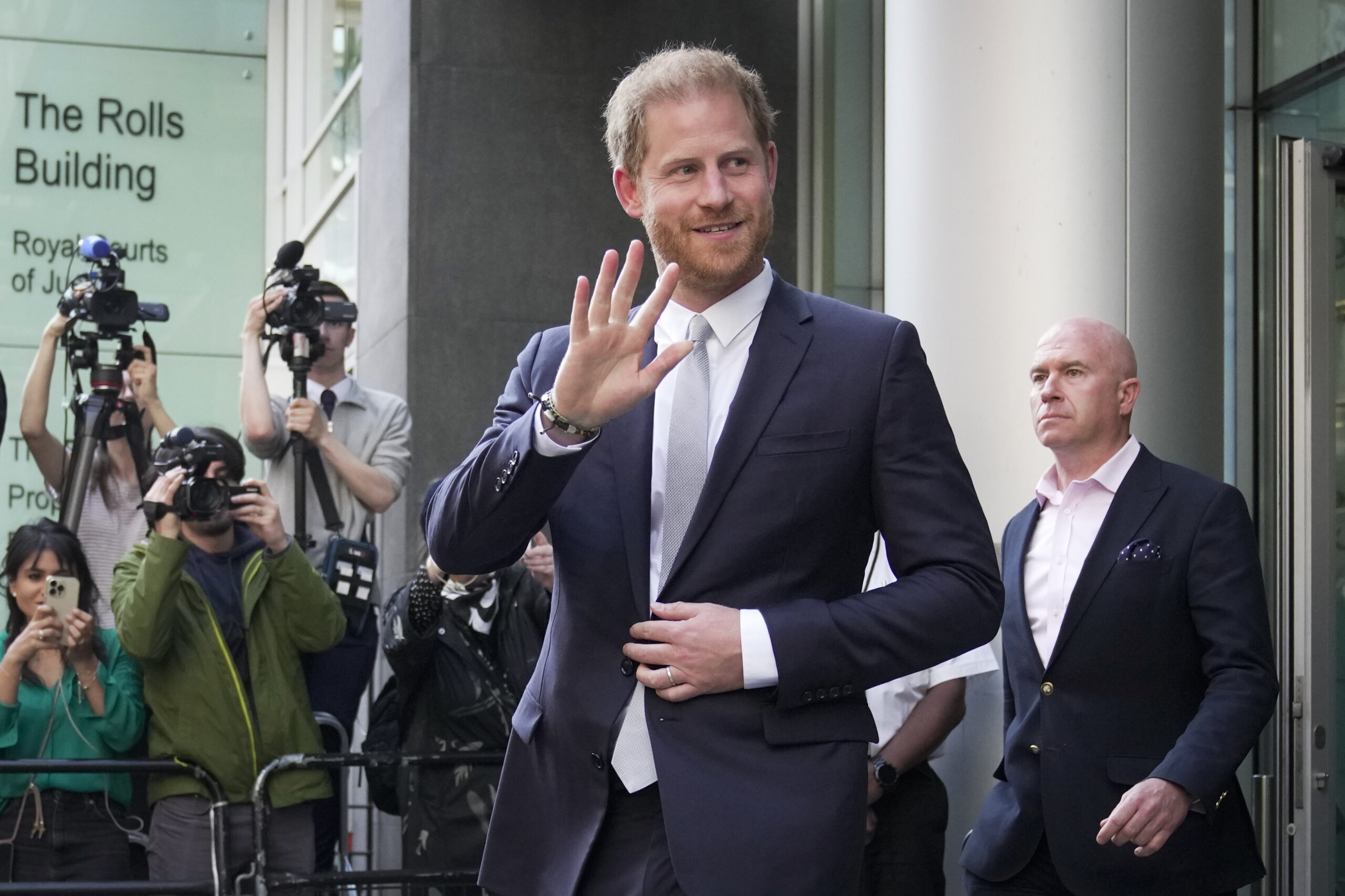 FILE - Prince Harry leaves the High Court after giving evidence in London, Wednesday, June 7, 2023....