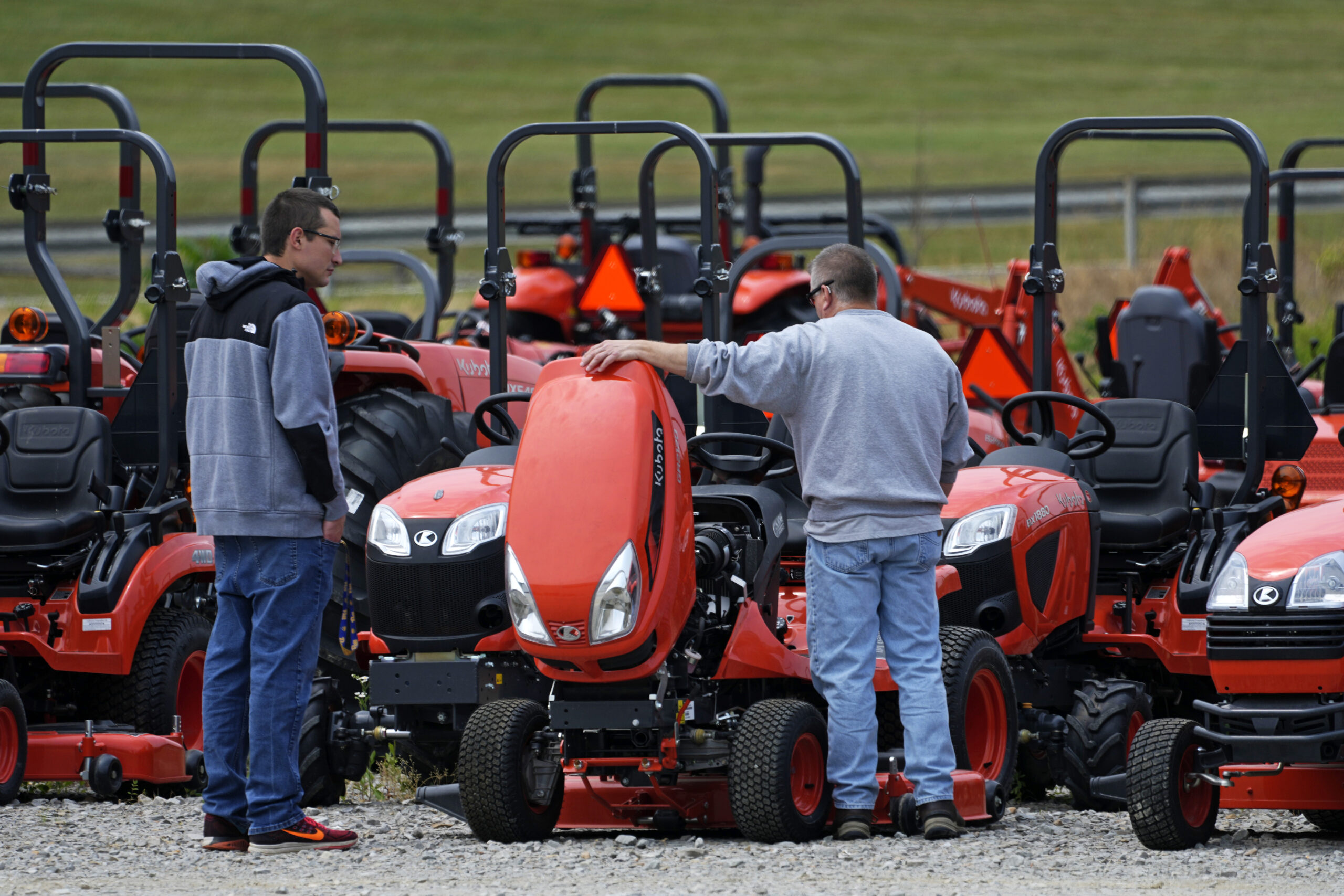 Men look at Kubota tractors at a dealer in Uniontown, Pa., on Friday, June 9, 2023. On Wednesday, t...