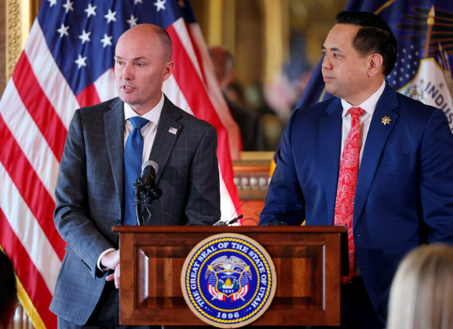 Gov. Spencer Cox is joined at the podium by Attorney General Sean Reyes as they take questions abou...