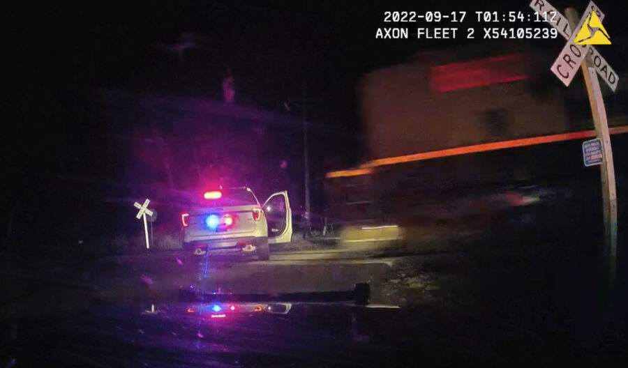 This screen grab from dash camera video provided by the Fort Lupton Police Department shows a freig...