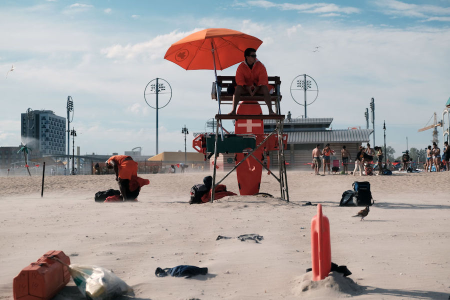 Lifeguards work at their station at Coney Island, one of New York City's most popular beach destina...