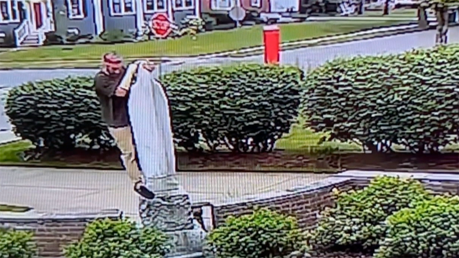 A Buffalo man is being charged with a hate crime after police say he knocked over a statue of Mary ...
