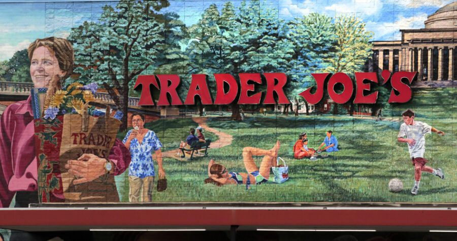 FILE - In this Aug. 13, 2019, file photo, Trader Joe's logo hangs on a mural at it's market in Camb...